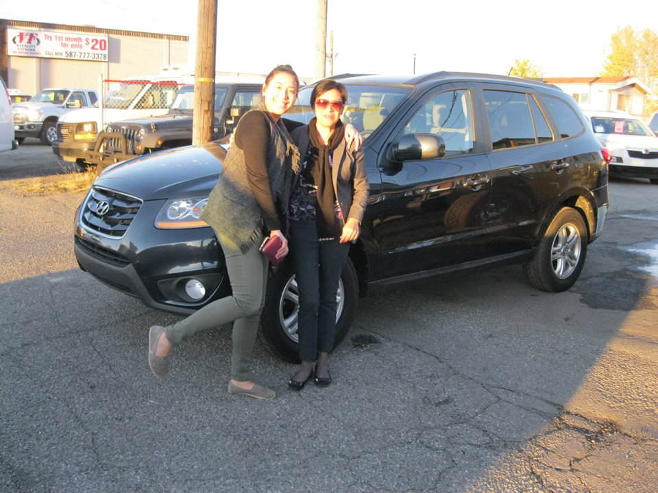 Agnes with her new Hyundai Santa Fe