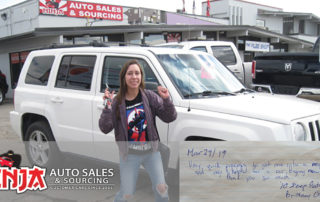 Brittany with her new Jeep Patriot